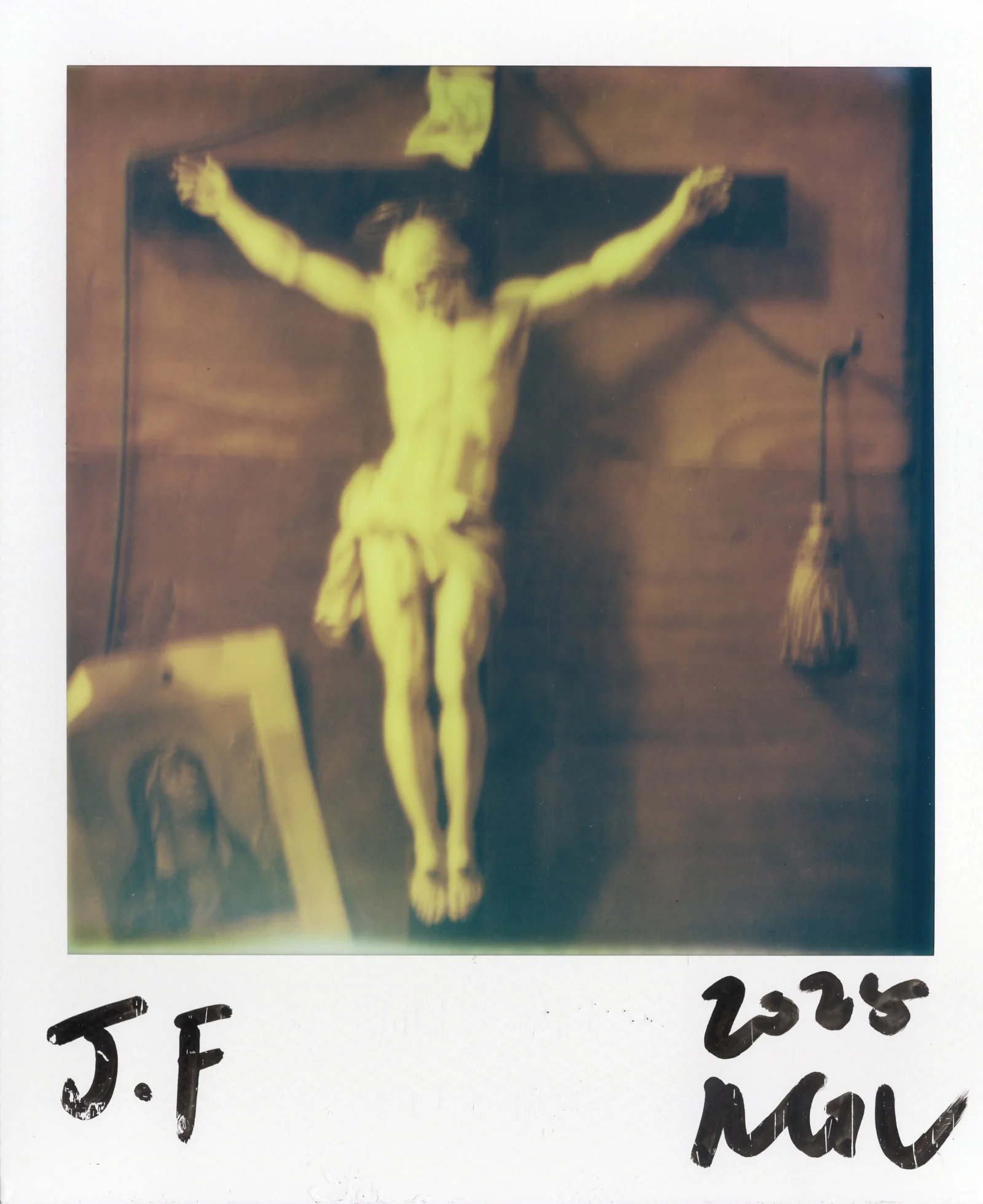 Polaroid artwork of a religious figure in warm yellow-brown light.