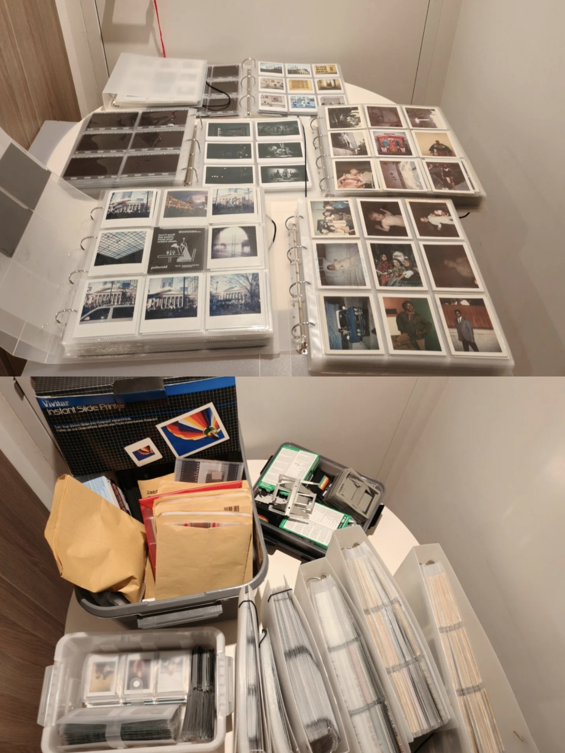 Albums, photographic materials and storage containers in a working archive.